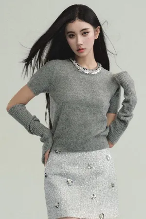 Elegant Layered Look: Pearl-Trimmed Cropped Sweater with Detachable Arm Warmers