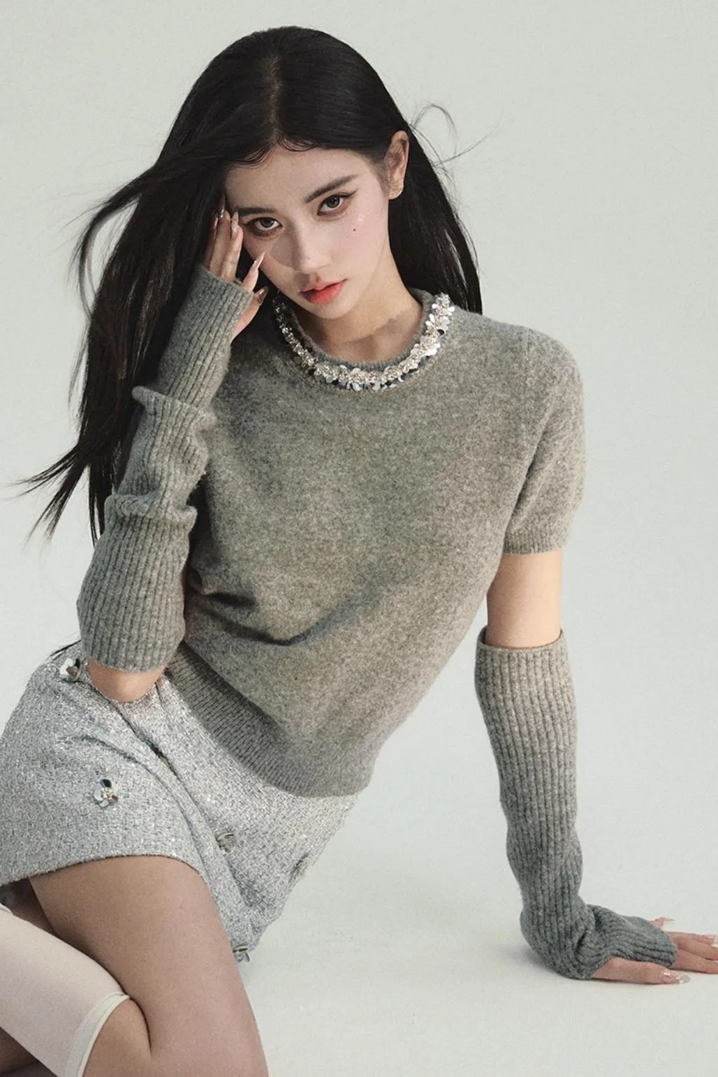 Elegant Layered Look: Pearl-Trimmed Cropped Sweater with Detachable Arm Warmers